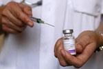 Photo d'une seringue et d'une fiole de vaccin